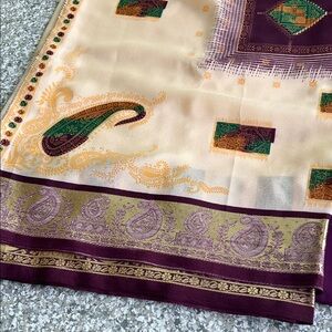 Elegant Paisley Sari with Purple and Gold Accents